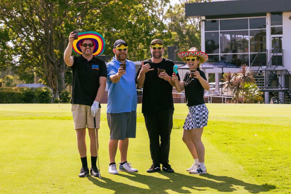 Four players taking a selfie in costume